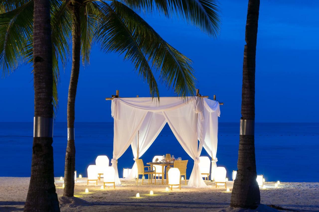 Oceanica Resort Panglao, Bohol Екстер'єр фото A beachside dining experience at the resort