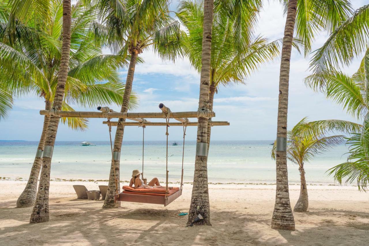 Oceanica Resort Panglao, Bohol Екстер'єр фото A swing at the beach